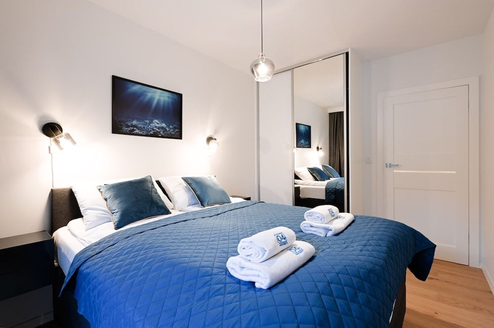 Aura 40 by Q4 Apartments.