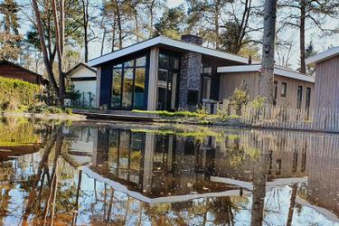 6-personne(s) maison de vacances Heidehoeve XL aan een vijverpartij