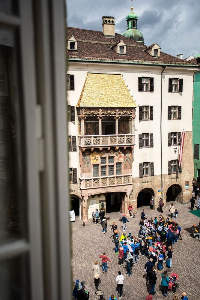 Golden Roof Apartments by Penz